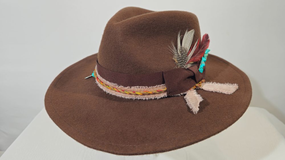 Canyon Relic — dark brown wide-brim hat with turquoise stone details and feathers