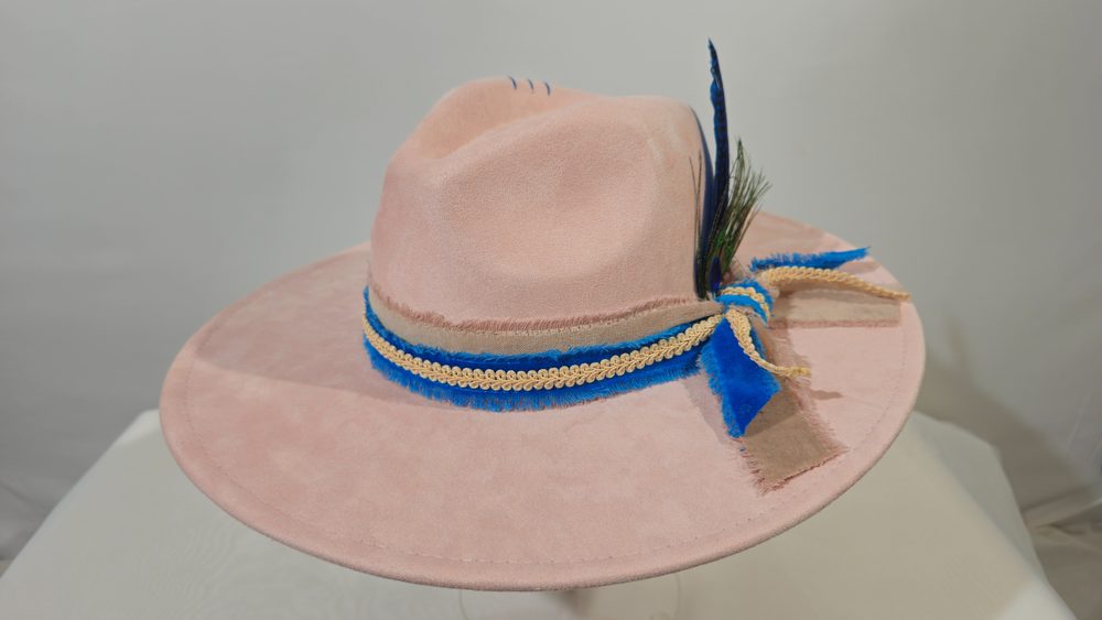 Peacock Reverie — blush pink wide-brim hat with peacock feather detailing