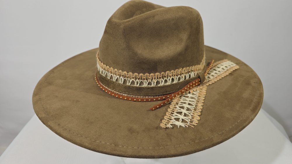 The Wayfinder — olive green wide-brim hat with woven trim and studded band